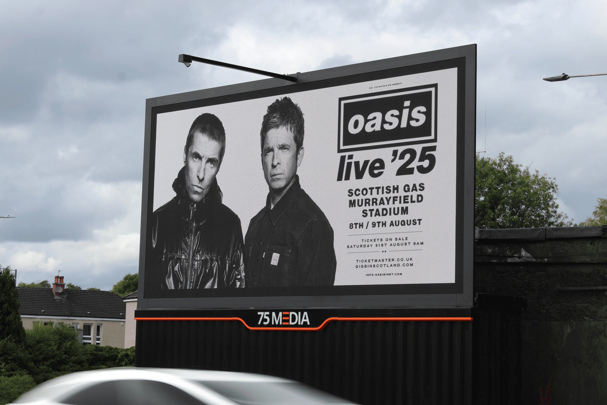 Liam Gallagher in CP Company: The Billboards Announcing the Return of Oasis